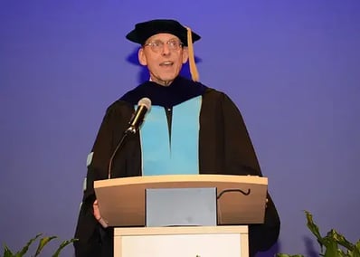 Cooley Law School President and Dean James McGrath speaks to graduates of the law school’s Tampa Bay campus
